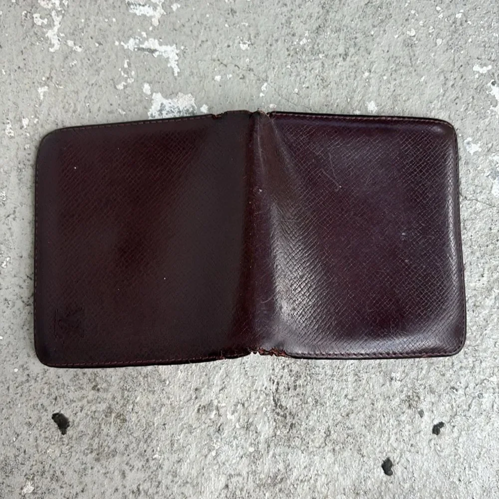 Vintage Louis Vuitton Taiga leather wallet